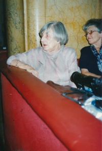 His mother, Olga Tomková, 2001