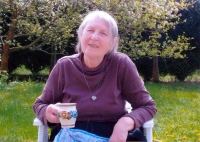 Milada Nováková in her garden in 2014