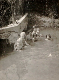 Family bathing, Maria and children