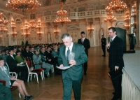 Ladislav Šupka in the Spanish Hall in the year 2000. On the occasion of the International Memorial Day he received an honorable recognition for his care of the city’s historic area. Deputy of the Ministry of Culture, Ing. Zdeněk Novák, is holding the microphone.