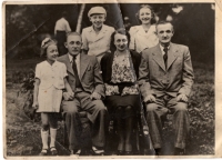 Věra with her parents and grandfather (from left), in the top row her siblings Zdeněk and Jitka