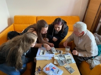 Viewing photos with the team from the project Stories of Our Neighbours 