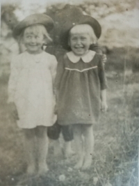 With her sister, photographed whilst still in Poland