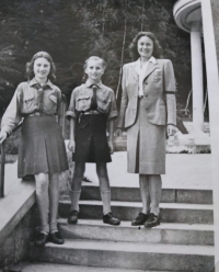 Maxmiliána Píšová in a Scout uniform with her younger sister and mother during the first weeks after the end of the war (her mohter is still wearing a black armband due to her brother's demise) 

