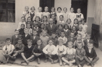 Jitka Zemánková (neé Pravdíková)- the fourth one on the right  in the third row, next to the teacher