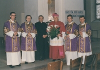 Alois Sassmann (second from right) being ordained as a deacon; Miloslav Vlk on his left side 

