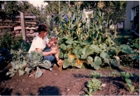 In the garden in Zahrádky with Baltazar, her dog, 1988 