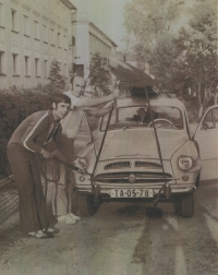 Jiří Olšaník with his father while loading his scull before leaving to a rowing competition, Tábor, 1975