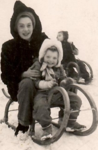 On a sledge with her mother, Prague, Riegerovy sady city park, 1947 