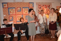 Eliška in the middle with her friends and colleagues, at an exhibition opening, Dům gobelínů/The House of Gobelins, Jindřichův Hradec, 2015 