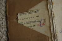 Detail of the Bible that Oldřich Kothbauer had with him in prison, labelled with his prison number 1973