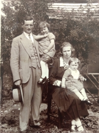 The Zika family, Ema held by her father, early 1930s