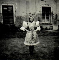 Vlasta in a folk dress celebrating liberation and the end of the war, 1945