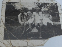 Photograph of children Jaromír, Věra, Hana, and Alena, which Jaromír Martinec Senior kept with him and hid in prison