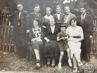 His fathe, Jaromír Homola (in the top left corner), with his family 