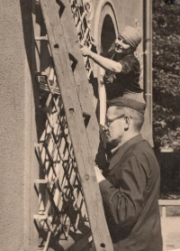 Václav Toužimský's parents working on a house, 1950s
