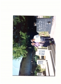 With brother Alexander at the graves of his parents