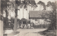 Forester's house in Dubina, her grandfather, Josef Krejčí, in the middle with a dog 