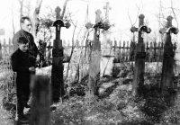 With his father, Josef, before leaving Volhynia, at a cemetery in Velky Spakov, 1947 
