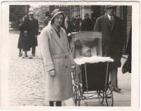With his mother, in a baby stroller, winter 1931 