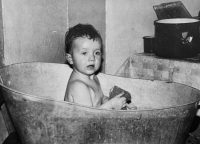 Taking a bath during holidays at grandma's. 1973