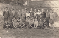 Year 7 of primary school, bottom row, third from the left, 1960