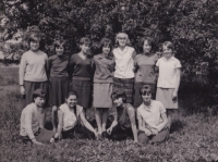 Anna Slanina in seventh grade, sitting second from the left 