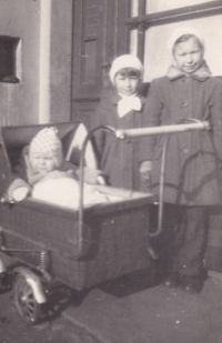 Seven-year-old Anna with her brother Maxmiliánem (in the stroller) and her older sister Marie, 1959 