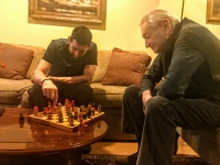 Juraj with his son David at chess.
