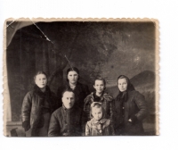 The Talanchuk-Turchenyak family after arriving at the place of special settlement, 1949