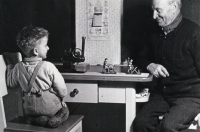 With his grandfather in Tachov, with windows covered during a blackout. 1942