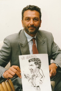 Ivan Gabal with his caricature, 1994