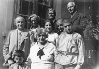 Ivan Olbracht's first journey (the back row on the right) to Podkarpatská Rus. His friends Mr. and Mrs. Ustyanovich stand next to him, 1931
