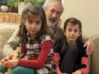 Peter with his granddaughters.

