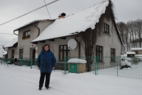 Anna Smržová in front of her house, January 2017