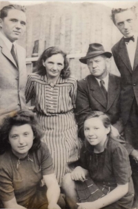 The Kovář family, bottom from left: sister Irena, the witness; top from left: brother Karel, mother Rozálie, father Jan and brother Jan, Hošťálková, circa 1945 