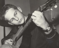 Playing the guitar, late 1960s/early 1970s