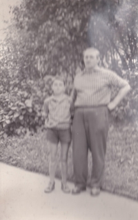 With his father, 1950s
