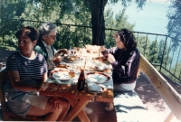 Seated at a table in a restaurant, there are Petr's mother Petra, Mrs. Vera Polackova, next to her Maria, Petr's second wife, across the table, Petr's daugher Karina. Pucón, Chile, 1996