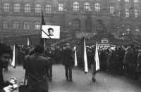 Antonín Podzimek carrying the flag in Jan Palach's funeral procession; his friend Jiří Janouškovec is carrying Jan Palach's portrait in front of him