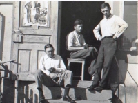 Three brothers in front of a tailor shop before the war, father David first on the right