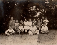 Eliška Saxlová, Petr's grandmother (sitting at the bench, second from right), at the family estate in Drasty by Klecany. 1925