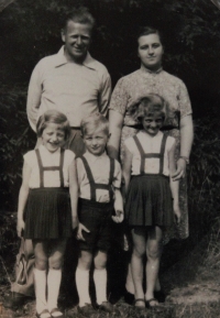 With his sisters, dad and aunt