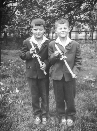 With his brother Stanislav (František on the left) before the First Holy Communion in the church in Křtěnov, 1965