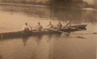 Josef Mišák in front of a rowboat, Gottwaldov 1950 
