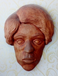Wood carving on which Jindřich Souček captured his daughter's likeness