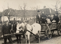 Helena Aková's brother (left) in front of the Vašek farm