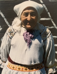 Godmother Mária Krchová, with which they run away from burning village