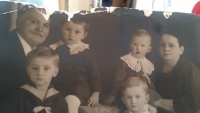 The sisters with their grandparents. Věra, bottom left