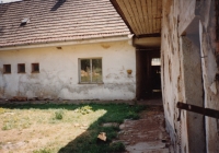 The Kolář family farm after the restitution. 1990